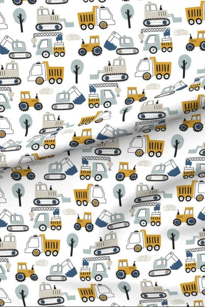 Construction Vehicles minky fabric — small hand-drawn diggers, dump trucks, tractors and cranes in mustard, navy and sage on white, with sage green trees