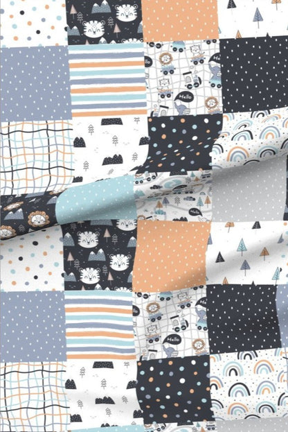 Tiger Lion Circus minky fabric — patchwork squares of tigers and lions, little cars, rainbows and pine trees with stripes, spots and grids in navy, peach and pale blue