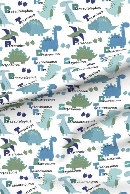 Blue Green Dinosaurs premium minky fabric — dinosaurs with their names in blue and green on white