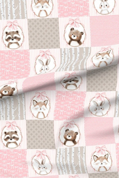 Pink Woodland Animals premium minky fabric — bears, foxes, racoons and bunnies in patchwork squares of soft pink and grey