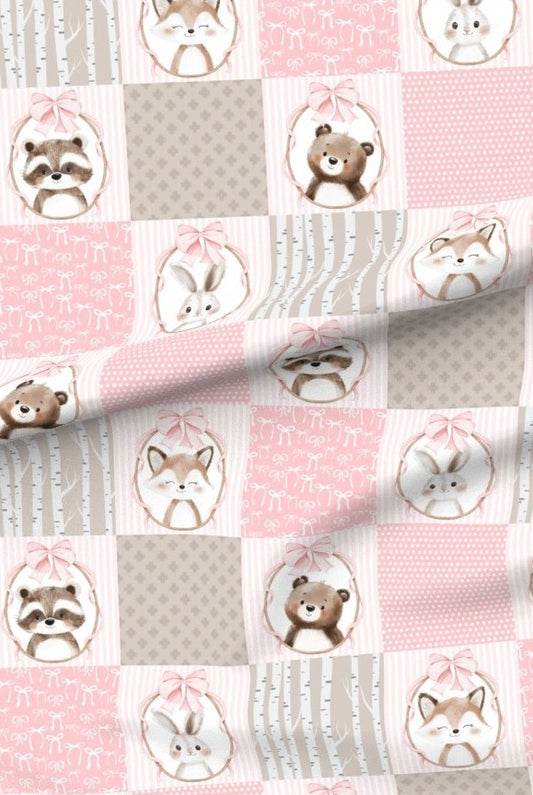 Pink Woodland Animals premium minky fabric — bears, foxes, racoons and bunnies in patchwork squares of soft pink and grey